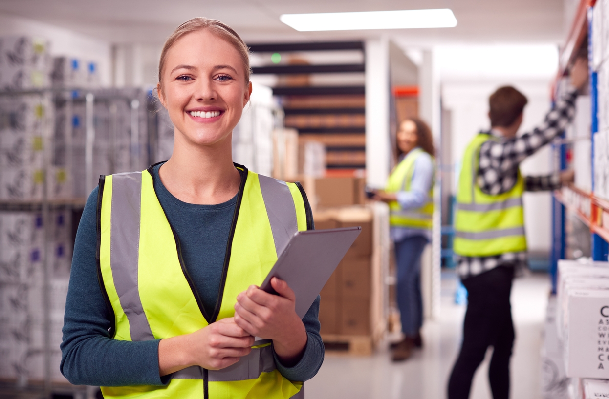 Portrait,Of,Female,Worker,Inside,Busy,Warehouse,Checking,Stock,On Portrait,Of,Female,Worker,Inside,Busy,Warehouse,Checking,Stock,On